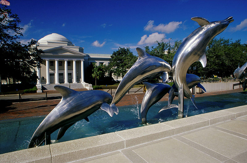 Outdoor stainless steel dolphin sculpture
