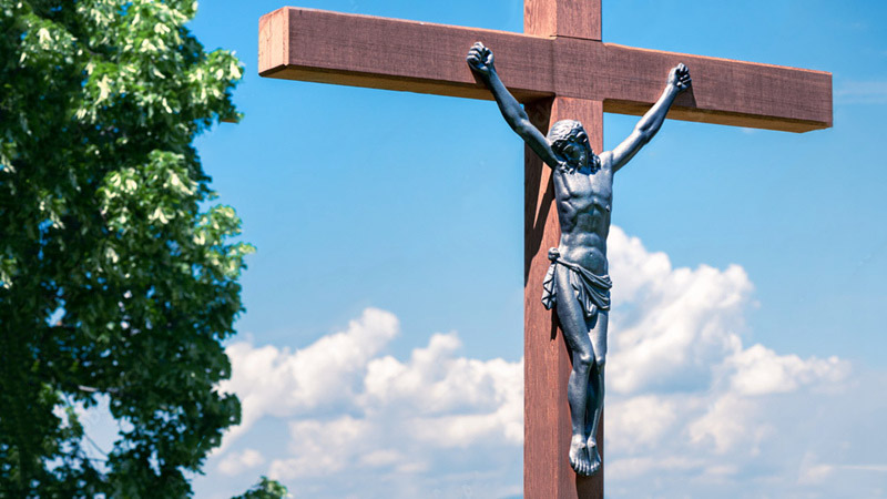 bronze Jesus on cross sculpture