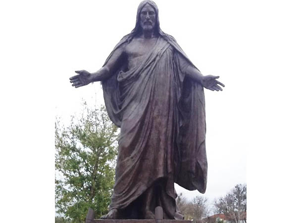 Bronze Jesus Christ statue in long robes