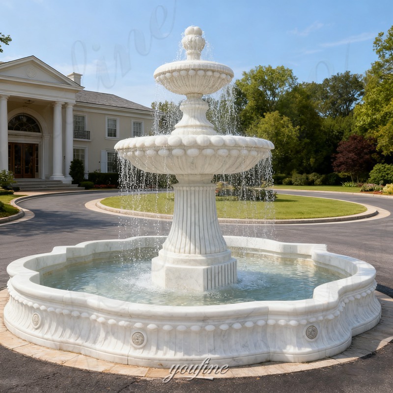 white outdoor tiered fountain