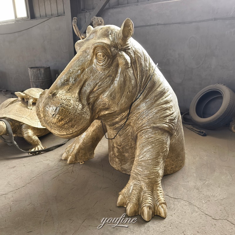polishing of of hippo statue