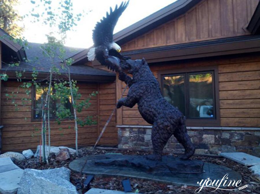 bronze bear and eagle sculpture