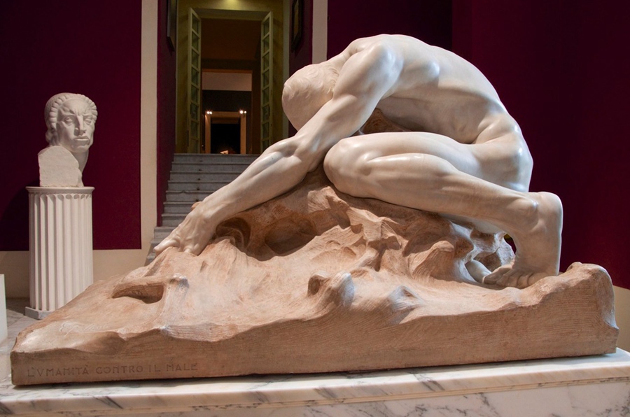 humanity against evil statue