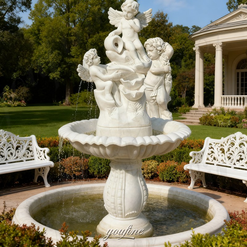 white cherub water fountain