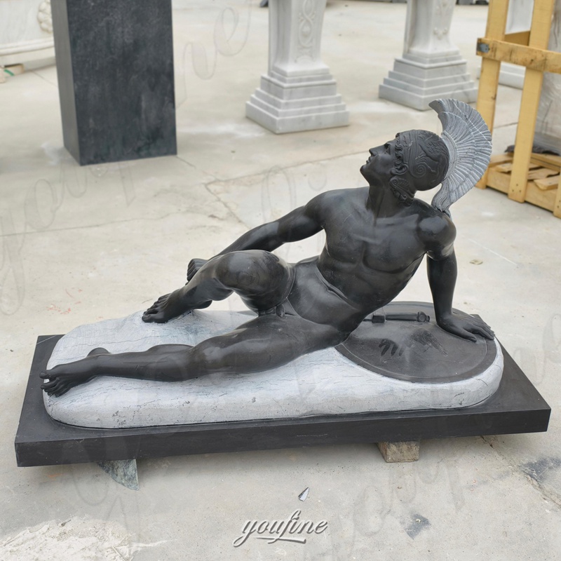 black dying warrior statue