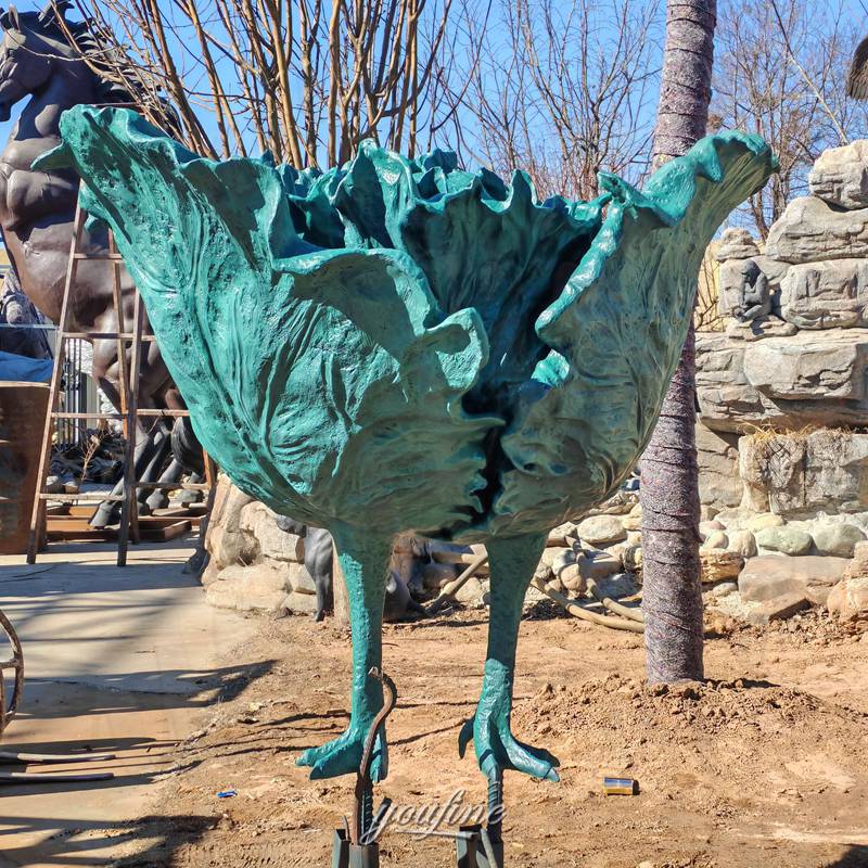 bronze of cabbage sculpture with chicken feet