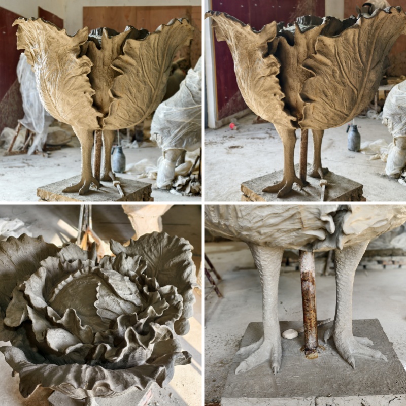 cabbage sculpture with chicken feet clay model