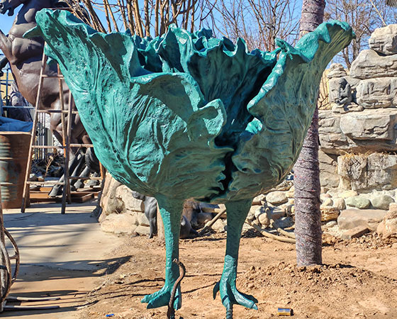 cabbage sculpture with chicken feet statue