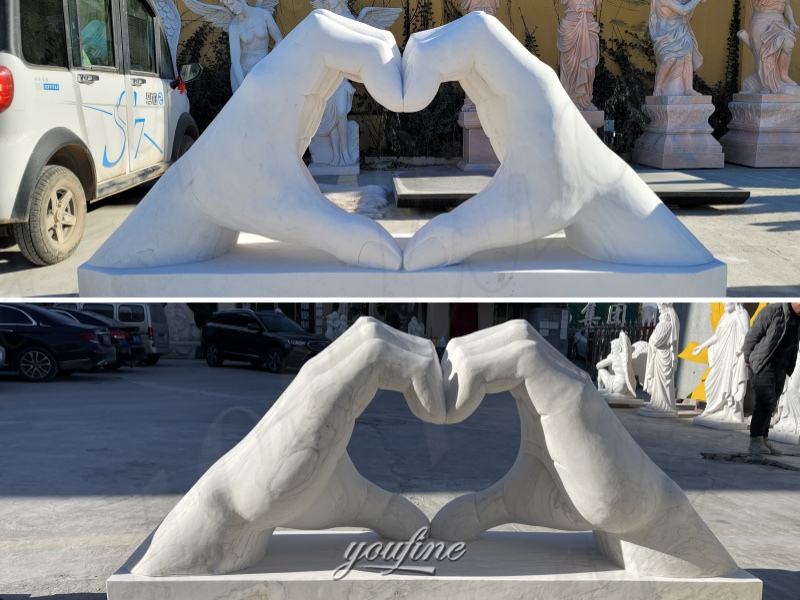 marble heart hand sculpture detail