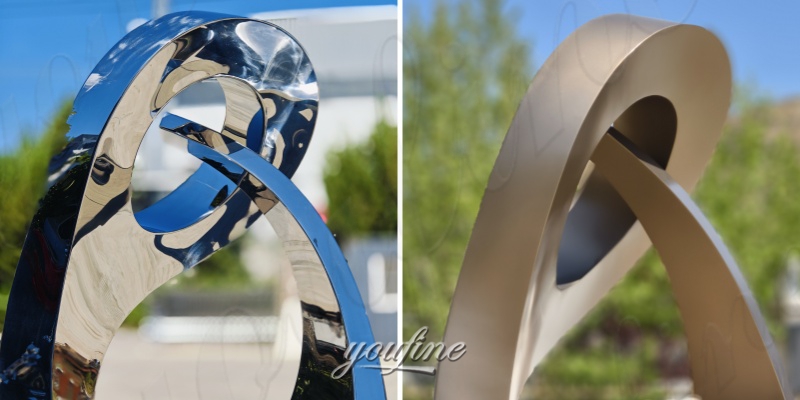 tall abstract sculpture different surface treatment