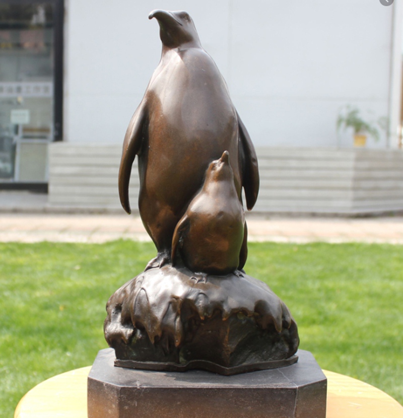 bronze penguin statue