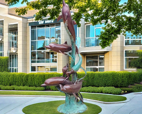 dolphin and mermaid garden statue