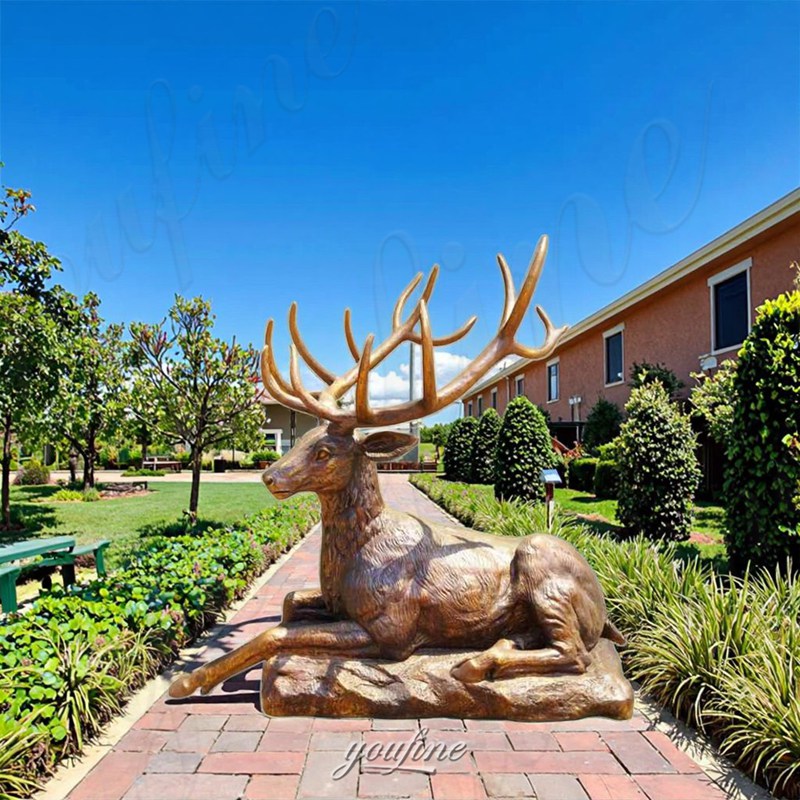 bronze laying deer sculpture