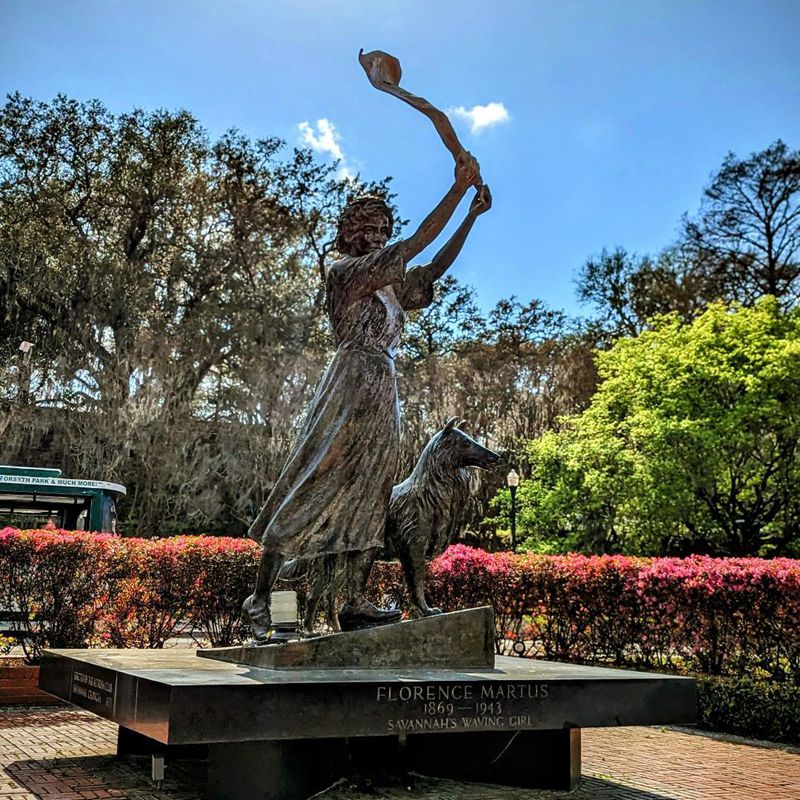 bronze waving girl statue