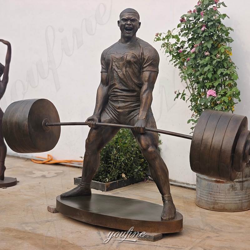 bronze weightlifter sculpture