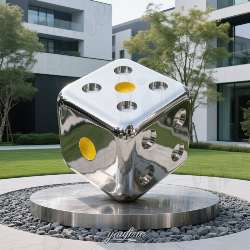 metal yellow dice sculpture