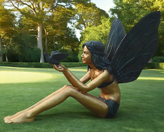 sitting fairy sculpture