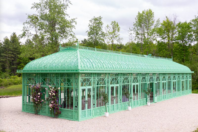 large green wrought iron conservatory