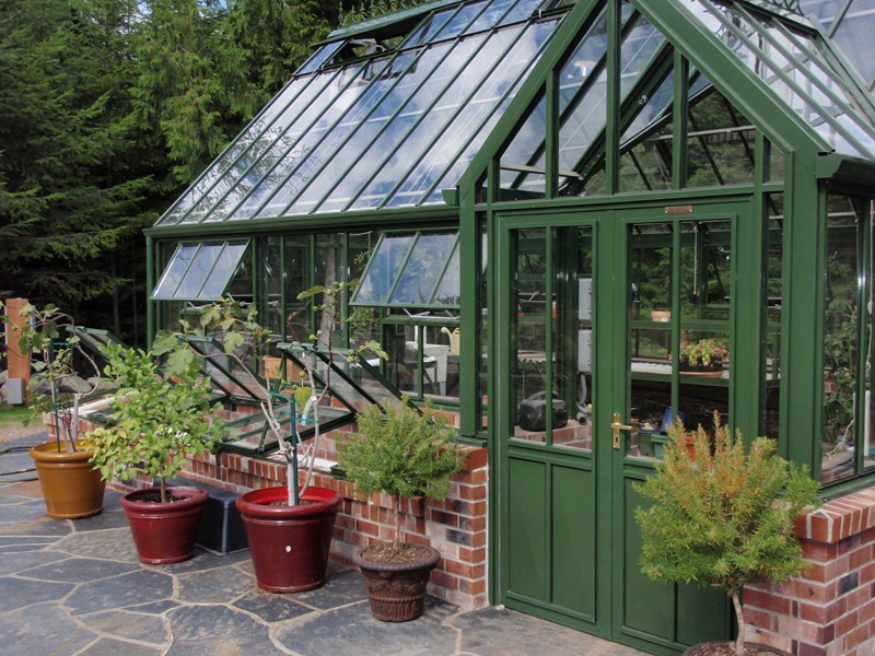 victorian glass greenhouse for planting
