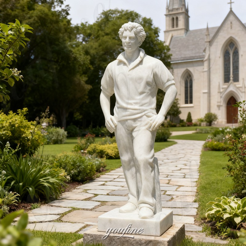 white Saint Carlo Acutis statue