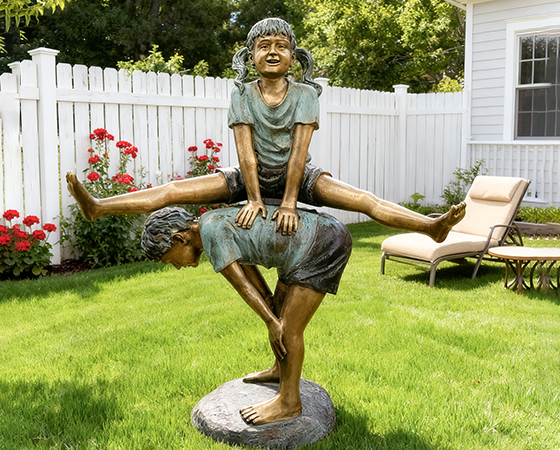 bronze leapfrog statue