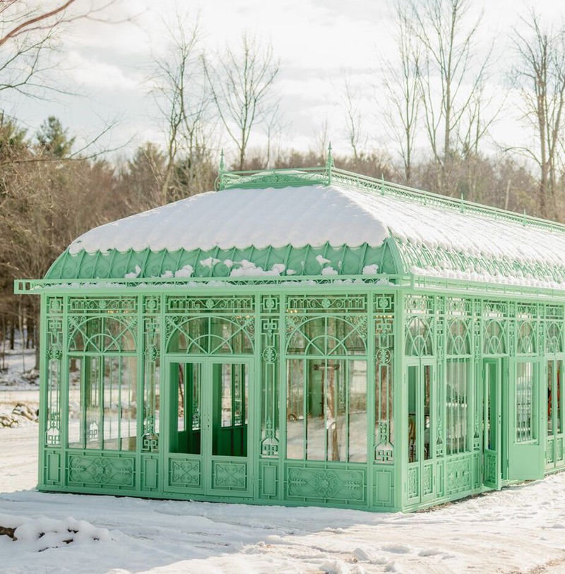 large victorian greenhouse in winter