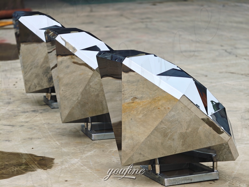 large metal diamond sculpture