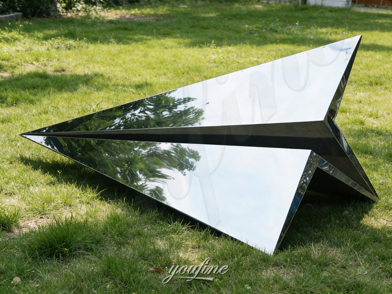 steel paper airplane sculpture