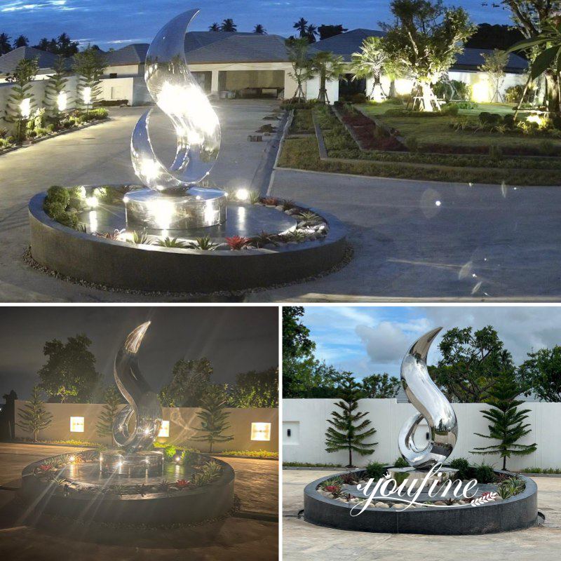 Stainless steel flame sculpture with light effects