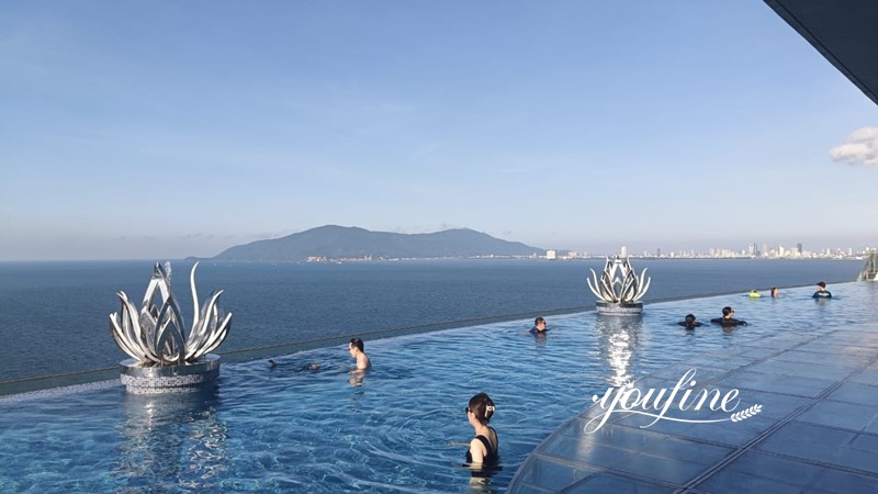 Stainless Steel Lotus Fountain Feedback: From a YouFine client at a resort in Vietnam. Installed in a second-floor infinity pool, this fountain is crafted from 316 stainless steel—making it highly rust-resistant—and blends seamlessly with its surroundings.