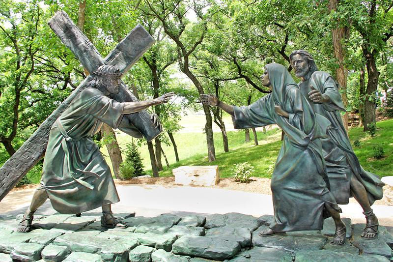 Jesus meets his mother along the walk.