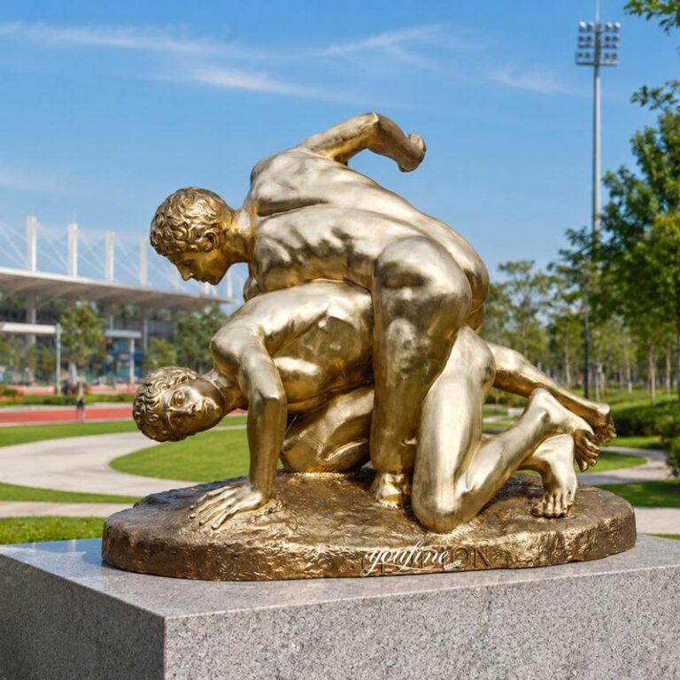 golden wrestlers statue