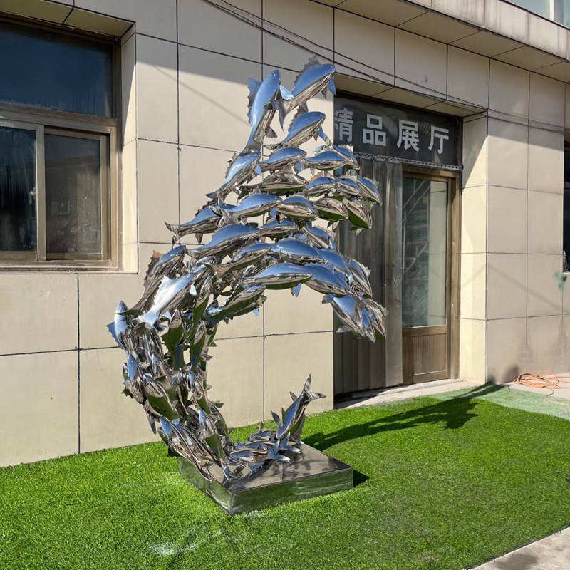 mirror steel fish sculptures
