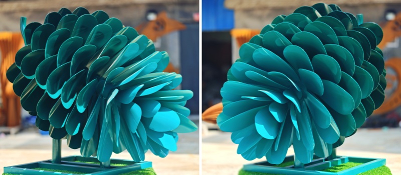 blue large metal pine cones