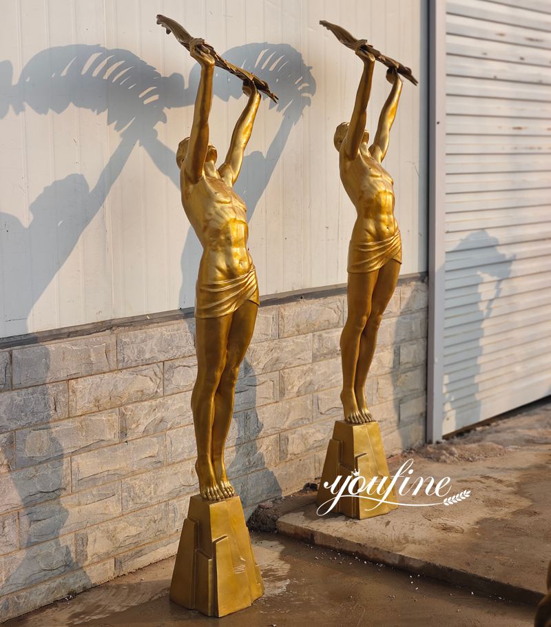 bronze sculpture athlete with palm leaf