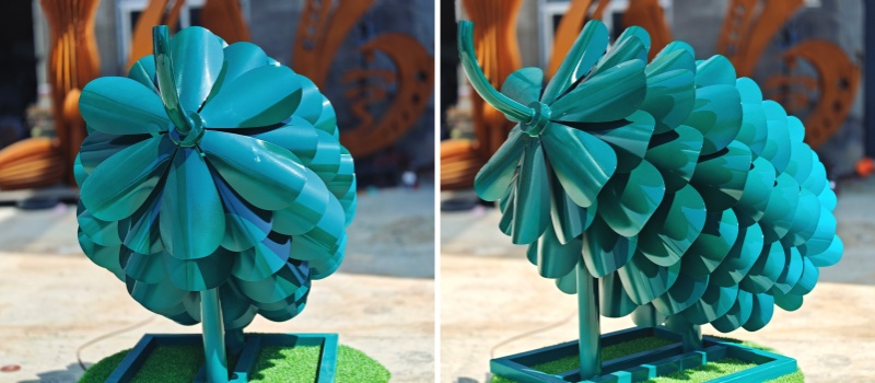large metal pine cones