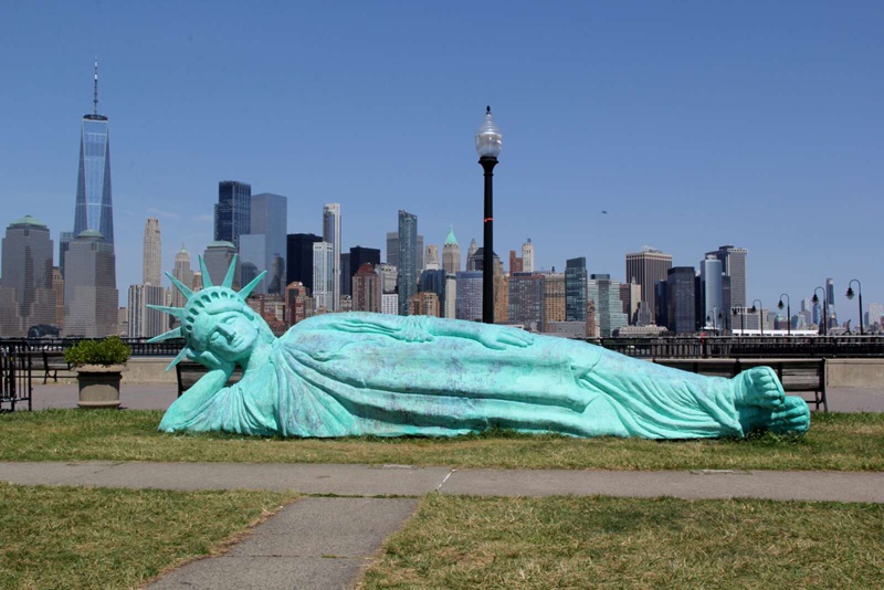 sculpture of liberty lying down