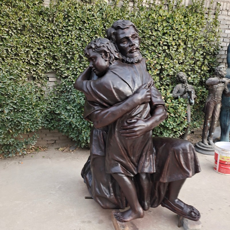 St. Joseph Embracing Child Jesus statue