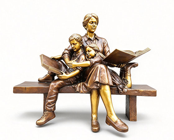 Bronze Reading Stories on Bench Sculpture