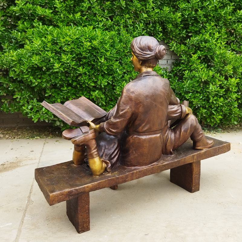 Reading Stories on Bench Sculpture